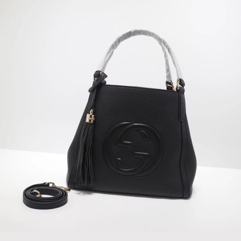 G*u*i top handle bags